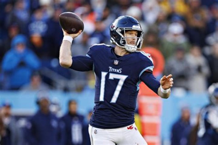 Ryan Tannehill pictured with the Tennessee Titans as he rushes for a touchdown during a game against the Baltimore Ravens in January 2020