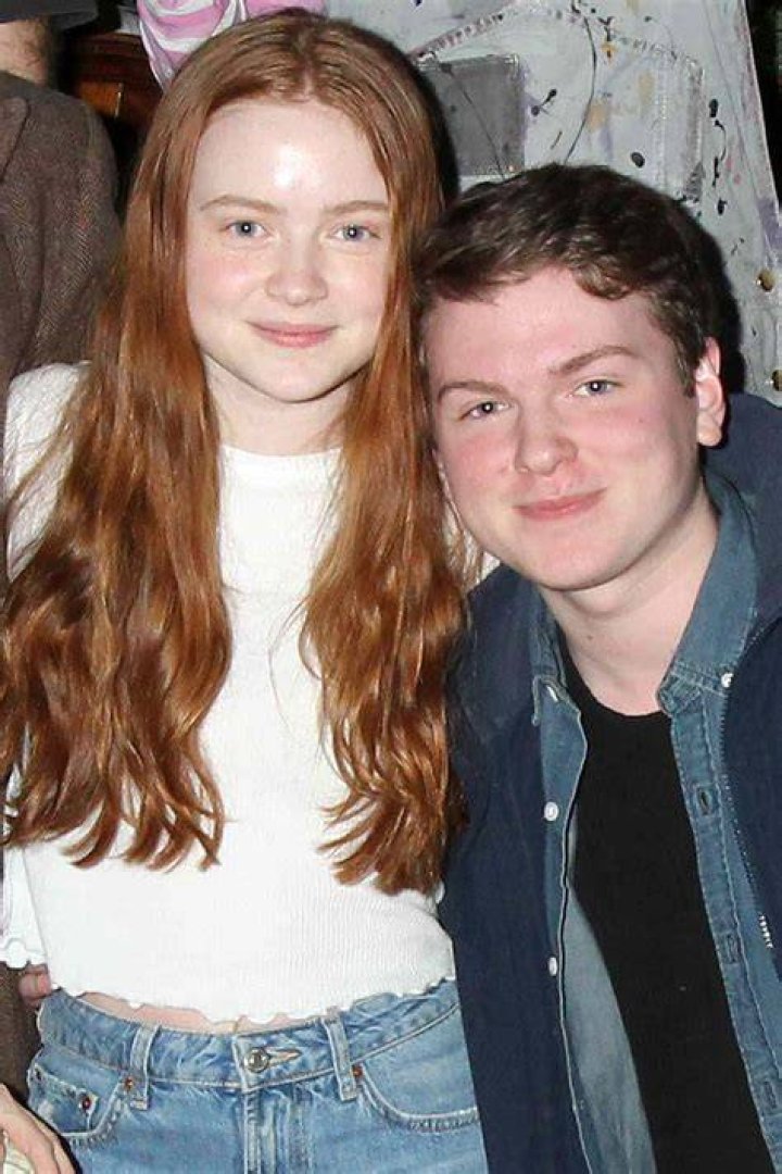 Sadie Sink with brother Mitchell, and agent John Mara Jr. at a football game in 2014 New York Giants vs Houston Texans