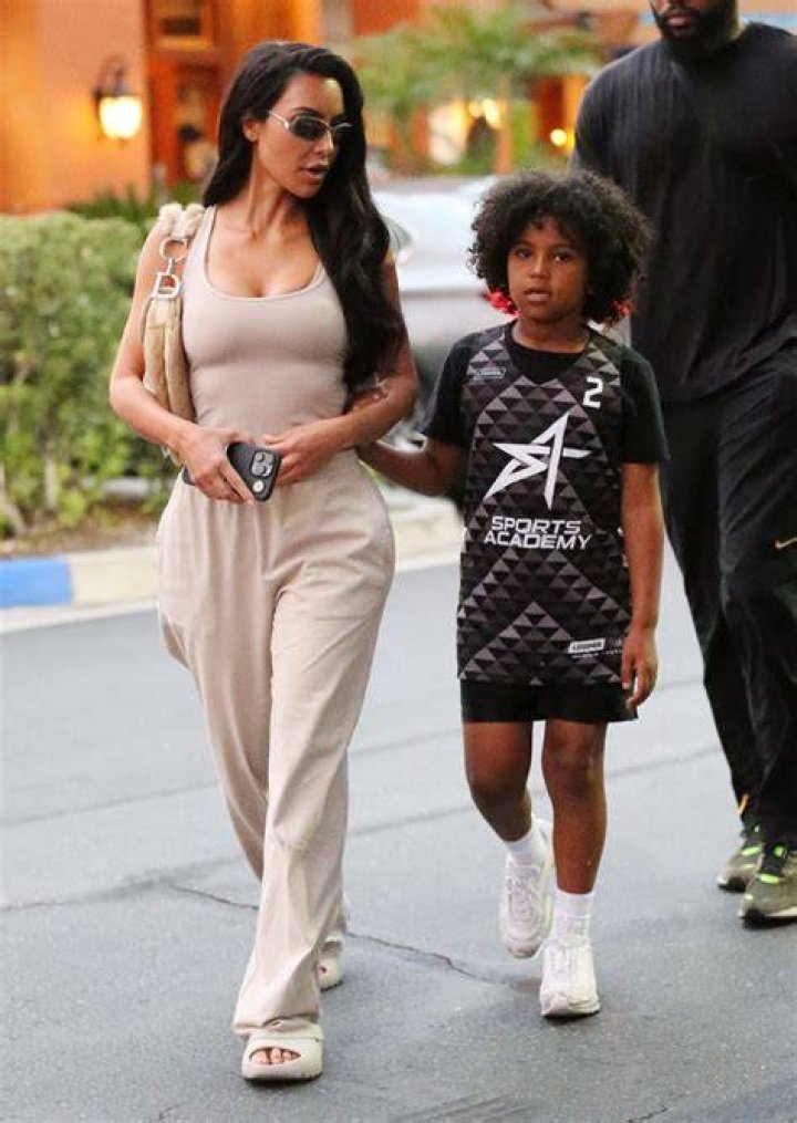 Saint West with mother Kim Kardashian West and older sister North