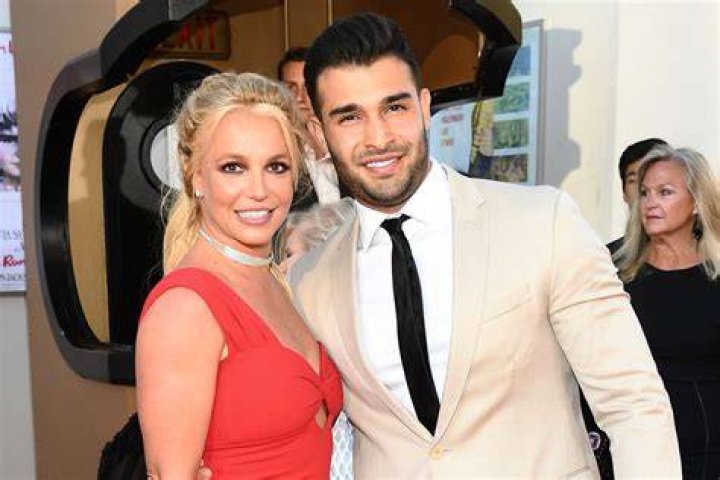 Sam Asghari and Britney Spears in a selfie while swimming in July 2018