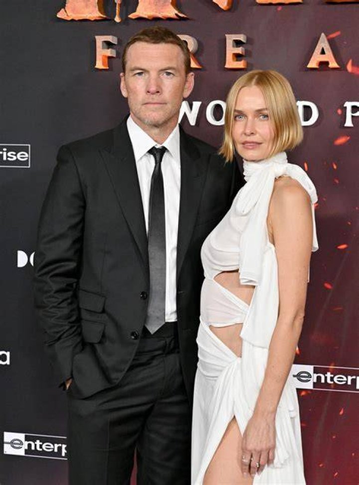 Sam Worthington and Lara Bingle leaving their NYC hotel in September 2014