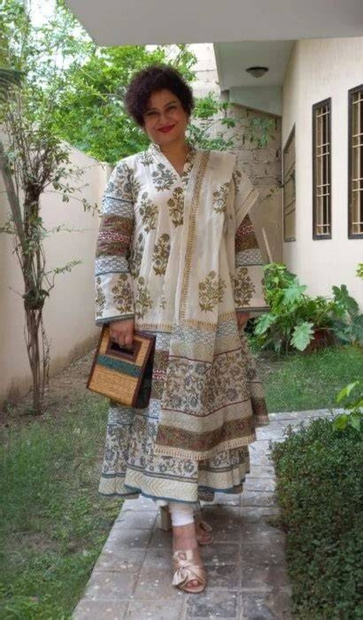 Sania Saeed as seen while smiling for a picture in July 2022