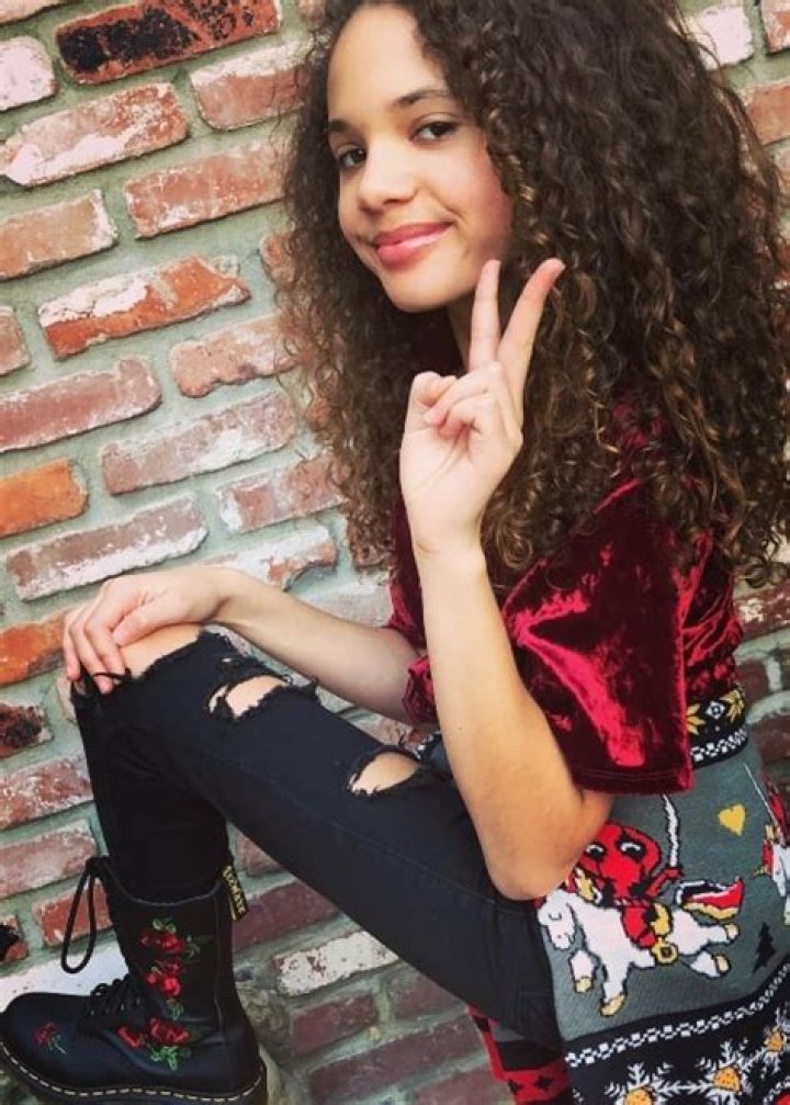 Scarlet Spencer as seen while smiling in a picture in March 2019
