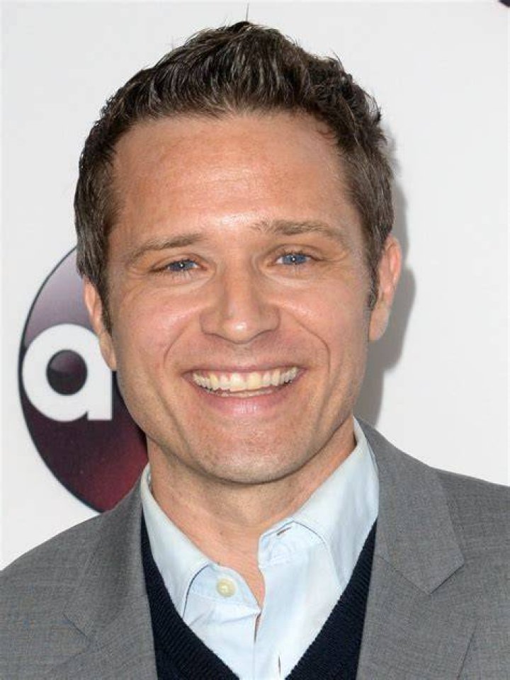 Seamus Dever smiling in a selfie with Juliana Dever in September 2021