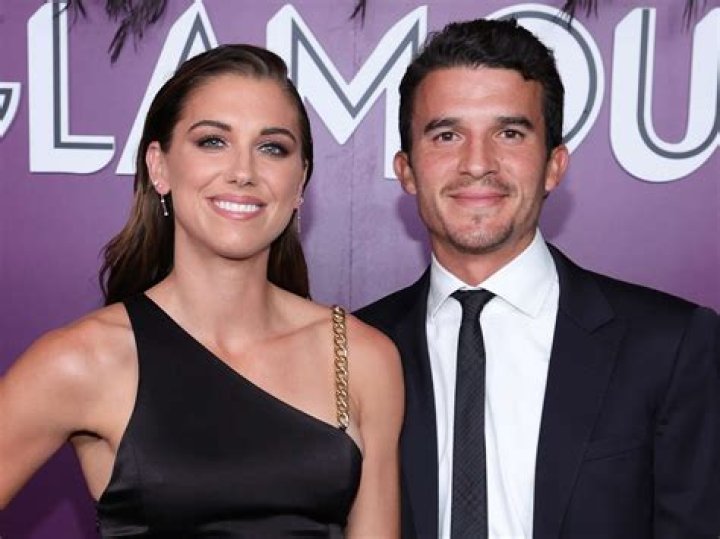 Servando Carrasco and Alex Morgan, as seen in December 2019