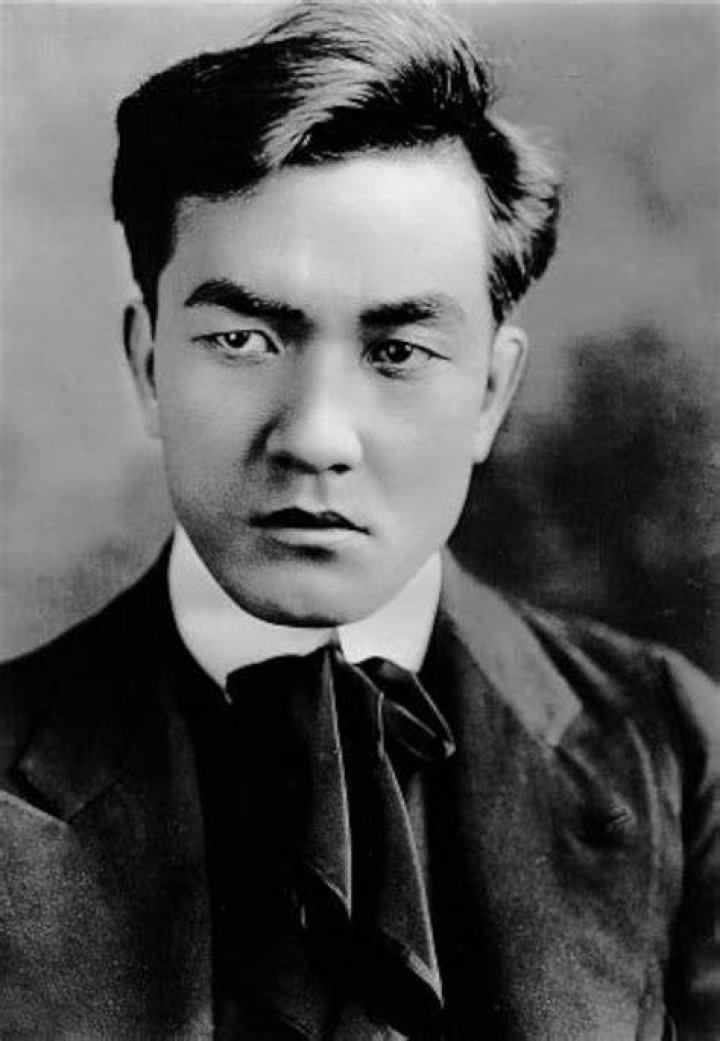 Sessue Hayakawa pictured with a flight attendant in New York, c. 1960