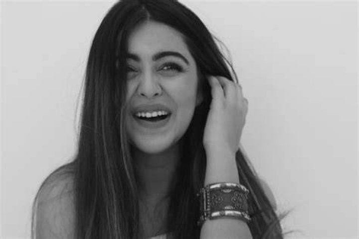 Shafaq Naaz as seen while smiling in a black-and-white picture in 2019