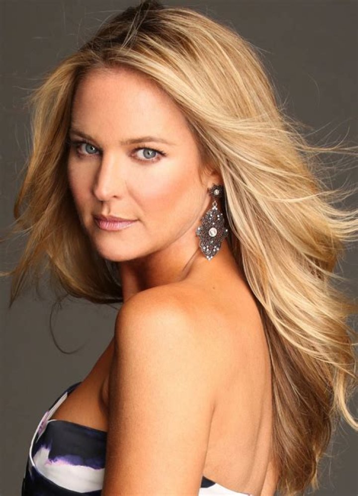 Sharon Case posing for a picture alongside Joshua Morrow at the 2013 Monte-Carlo Television Festival