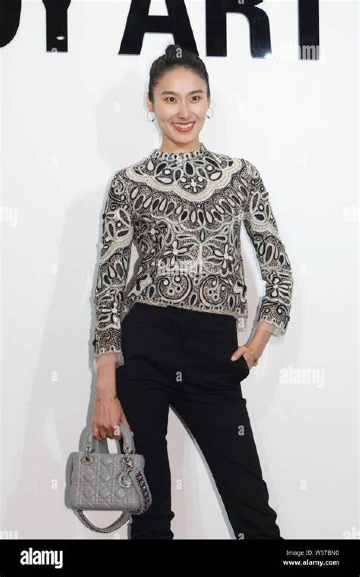 Shu Pei Qin attends the Giorgio Armani Prive show as part of Paris Fashion Week Haute Couture Fall / Winter 2013-2014.