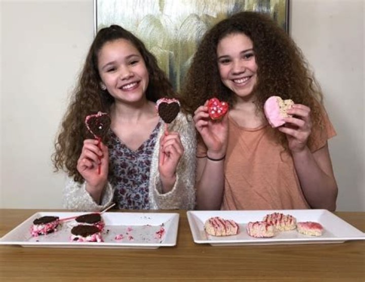 Sierra Haschak (Left) as seen while posing for a picture along with her older sister, Madison Haschak, showing their DIY Valentine&rsquo;s Day Heart Treats in February 2018