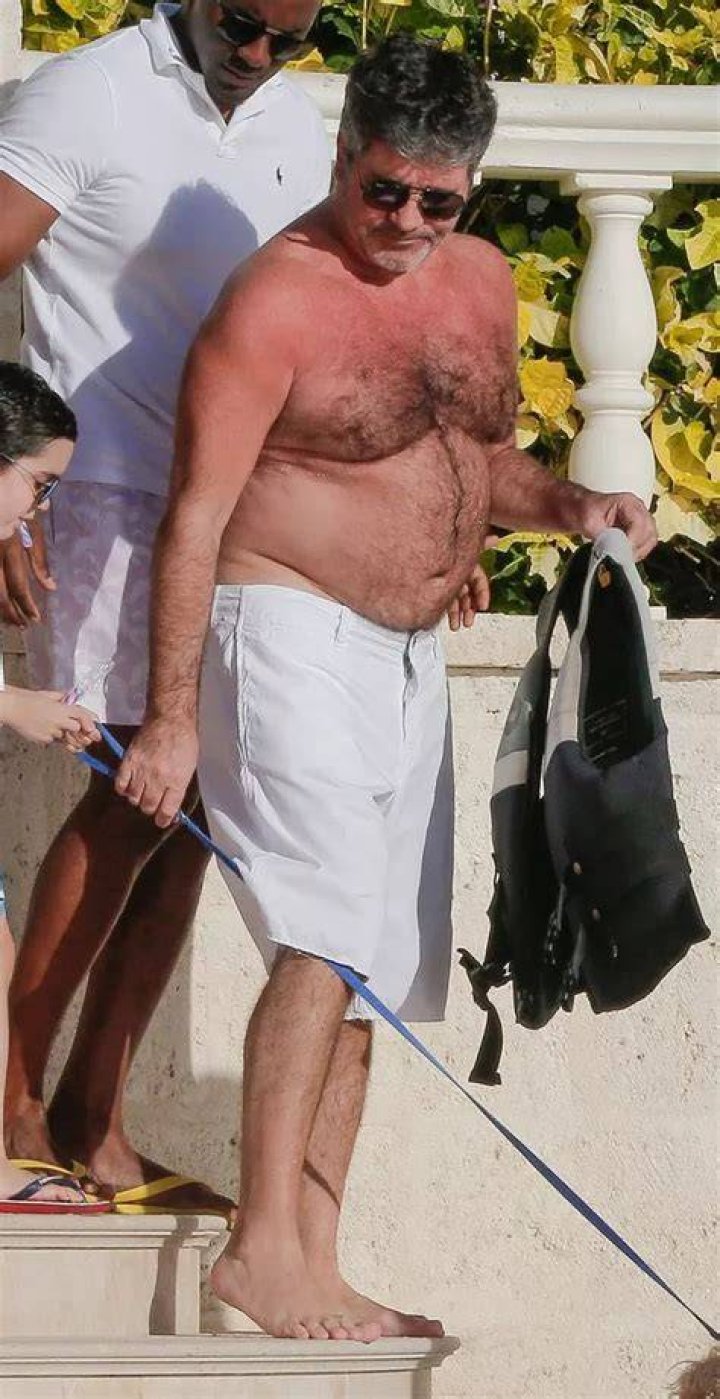 Simon Cowell shirtless body at a Barbados Beach in December 2008