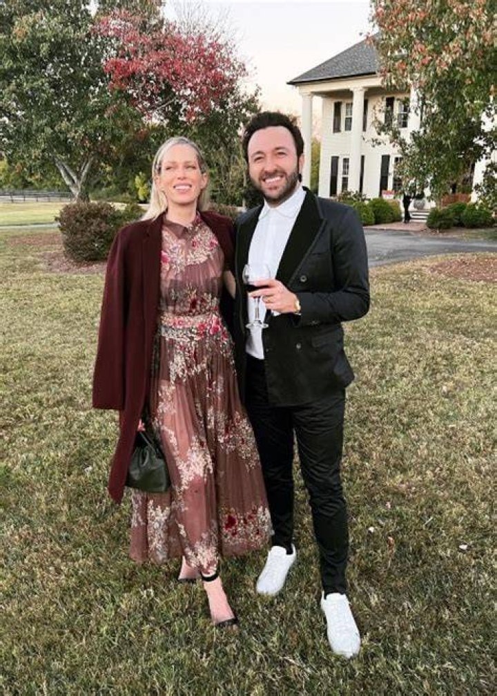 Simon Tikhman as seen in a picture with his wife Erin Foster that was taken in September 2022