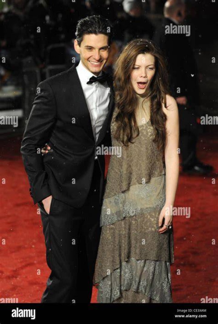 Skandar Keynes with Georgie Henley at a private party