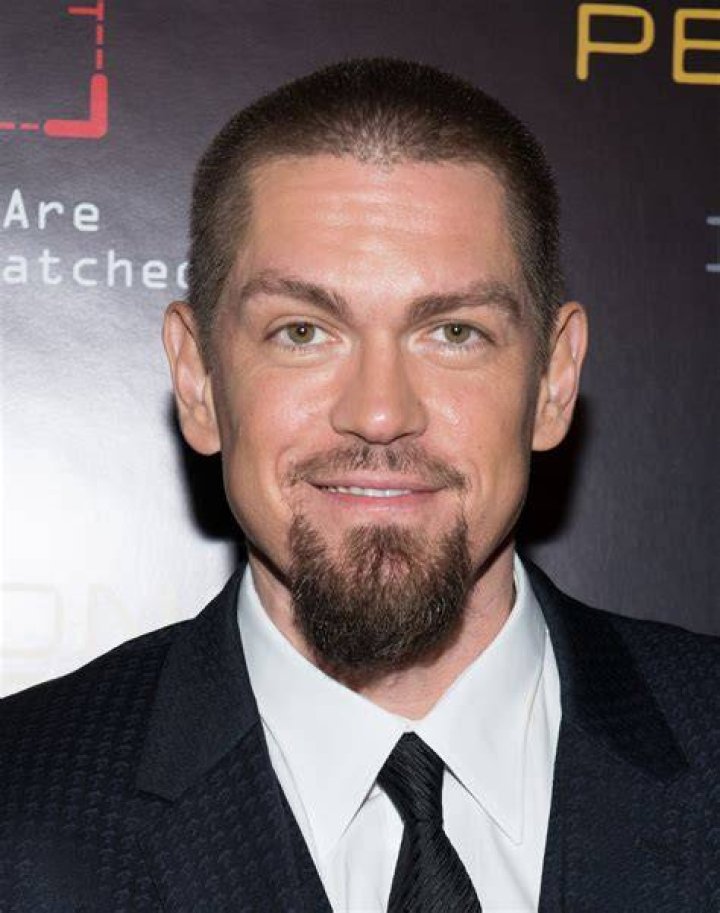 Steve Howey in a black-and-white selfie with Sarah Shahi in July 2018