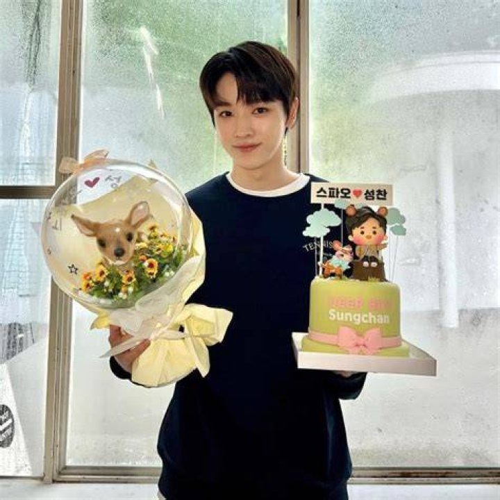 Sungchan as seen while posing for a picture in August 2022