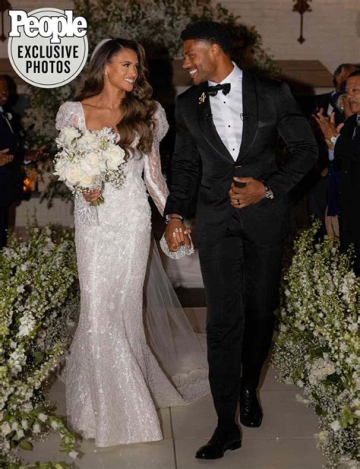 Sydney McLaughlin and Andre Levrone Jr., as seen in April 2021