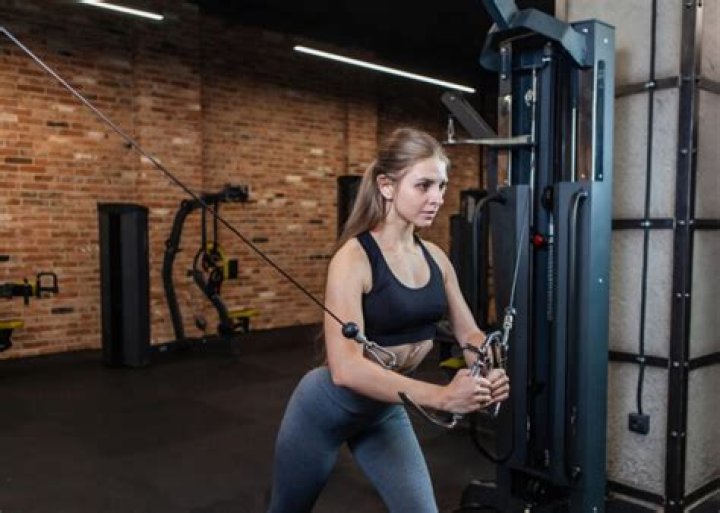 Tamra Barney doing cable crossover for chest