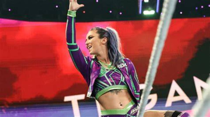 Tegan Nox wrapped in the Welsh flag, as seen in April 2019