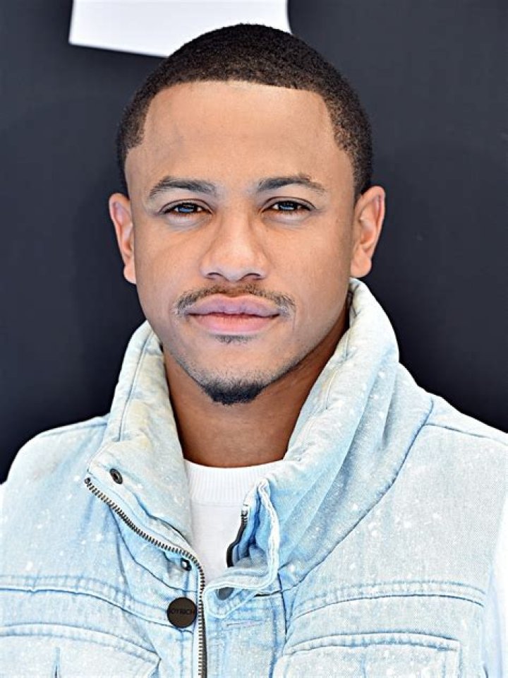 Tequan Richmond posing for a picture alongside Lala Milan in March 2020