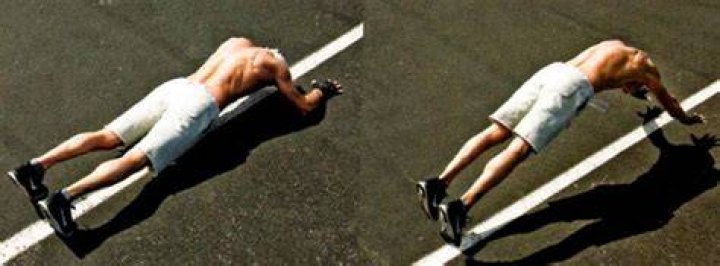 Tim Mcgraw doing modified pushups