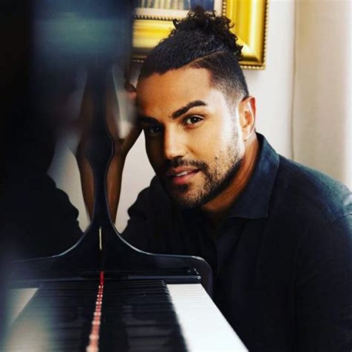 TJ Jackson as seen with other members of 3T performing the song I Need You in 1996