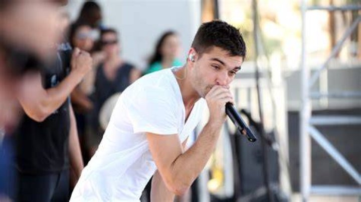 Tom Parker as seen while taking a selfie with his wife Kelsey Hardwick