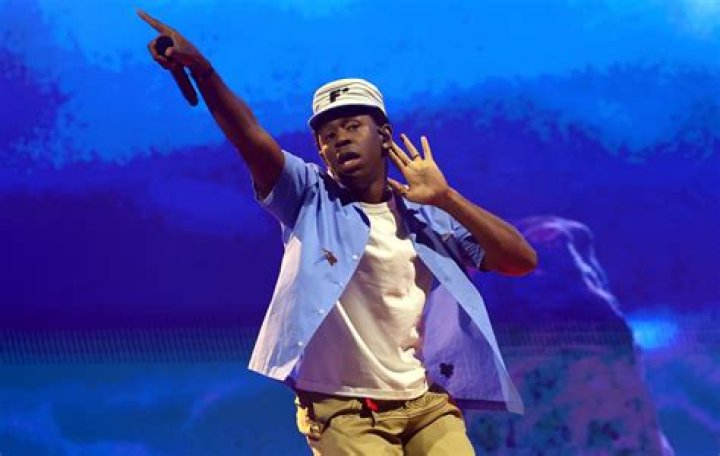 Tyler, The Creator posing during an event