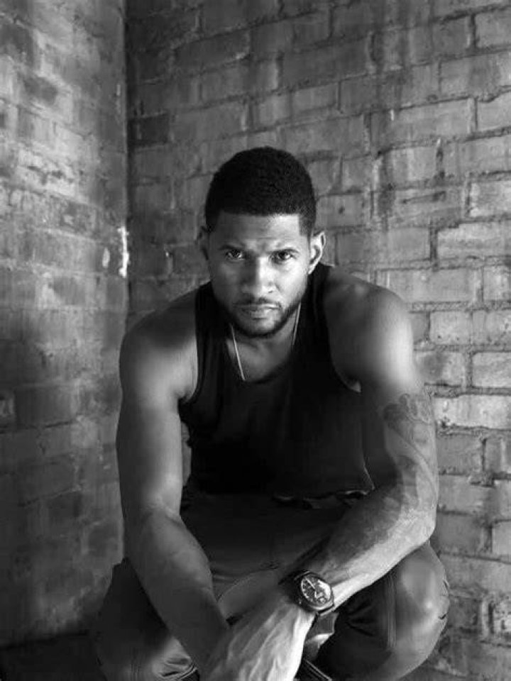 Usher posing for Men's Health Magazine in their November 2013 Issue