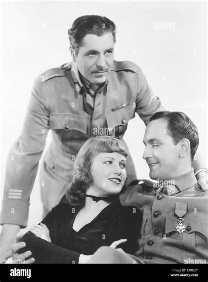 Warner Baxter, June Lang, and Fredric March as seen in the 1936 film The Road to Glory