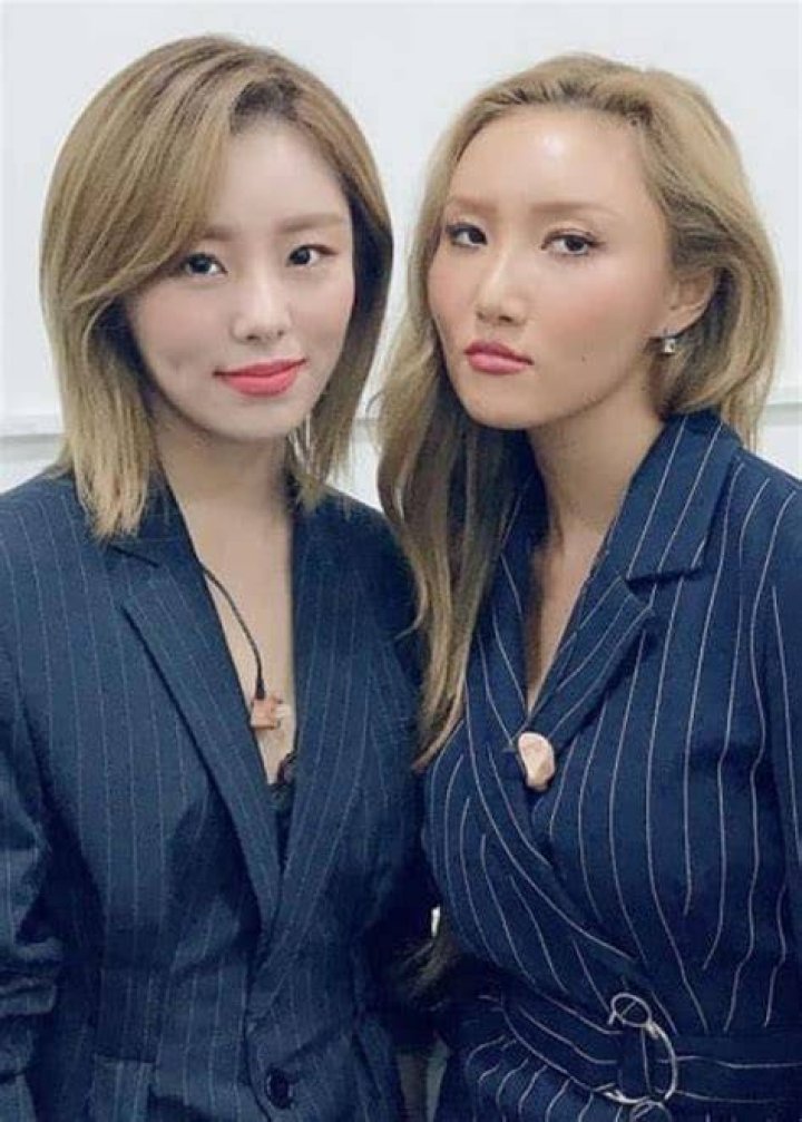Wheein (Left) as seen while posing for a picture alongside her Mamamoo bandmate, Hwasa, in May 2019