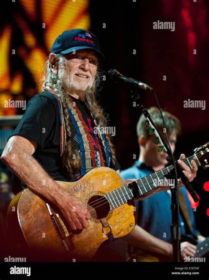 Willie Nelson performing on stage as seen in June 2011