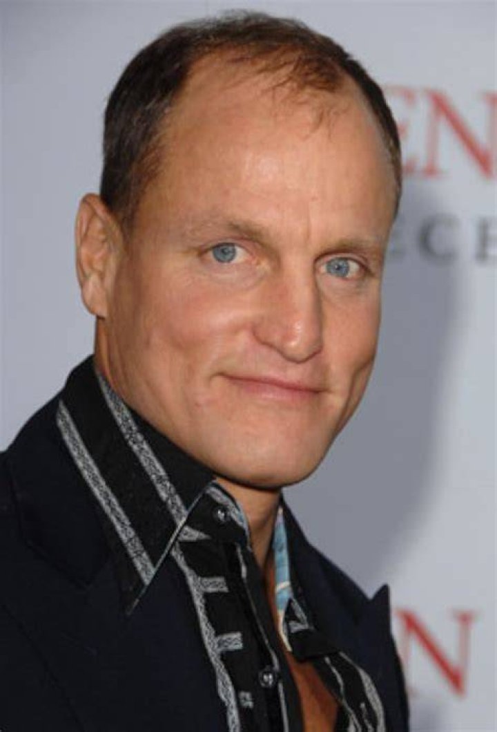 Woody Harrelson walking hand in hand with wife Laura Louie in New York City on May 22, 2013