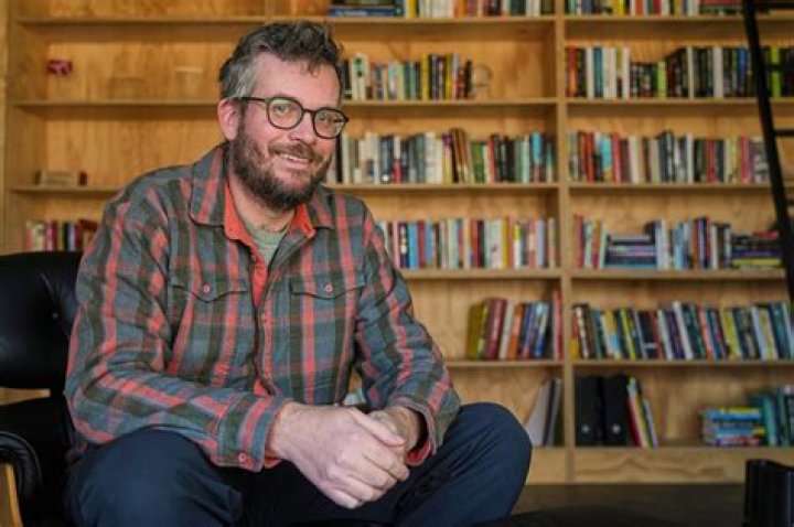 Writer John Green with his wife Sarah Urist and his son Henry who was born in 2010