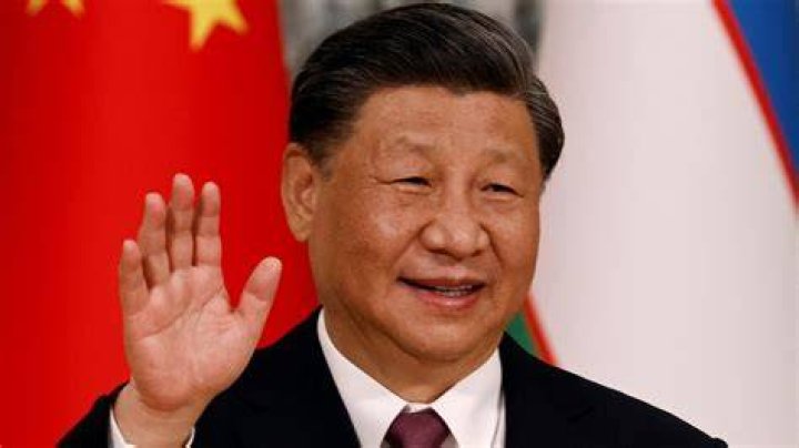 Xi Jinping as seen smiling in July 2019