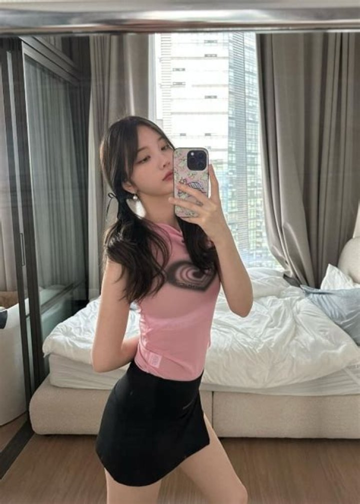 xooos as seen in a selfie taken while holding a product from Christian Dior in May 2023