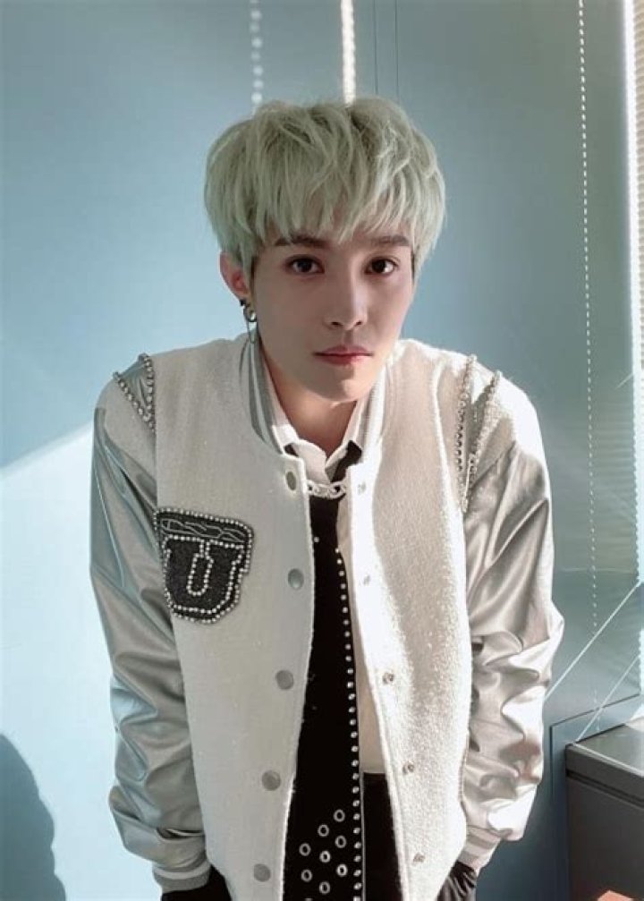 Yangyang as seen while posing for a picture in December 2021