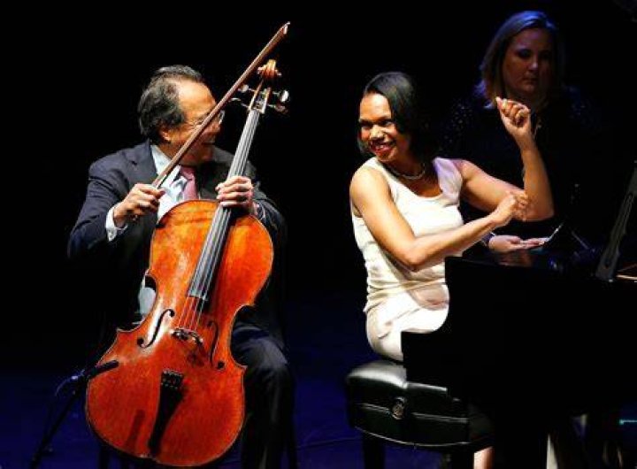 Yo-Yo Ma and Condoleezza Rice pictured after performing a duet at the presentation of the 2001 National Medal of Arts and National Humanities Medal Awards