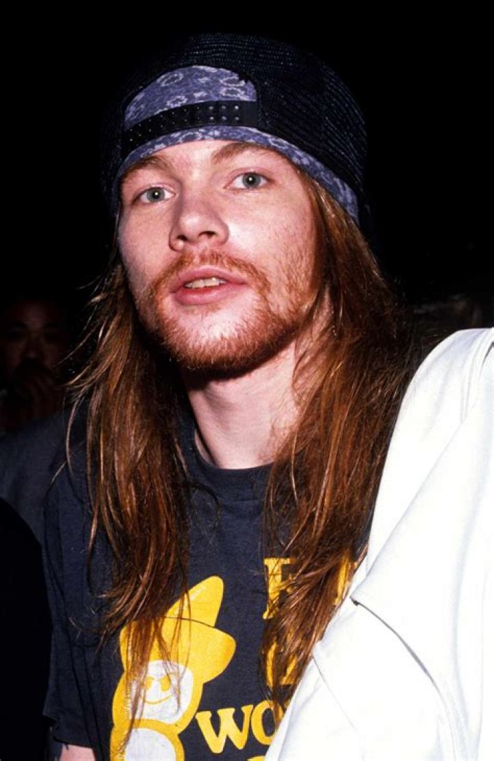 Young Axl Rose showing his shirtless body