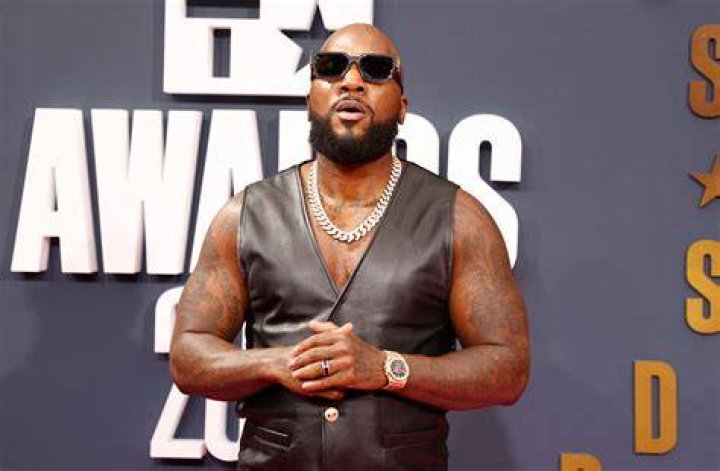 Young Jeezy wearing golden watch