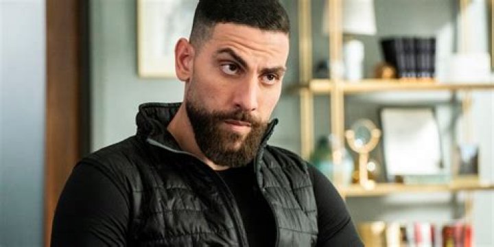 Zeeko Zaki in December 2021 having fun running into fans at a football game